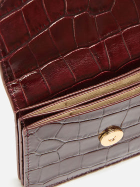 Card Holder in crocodile-print bordeaux leather