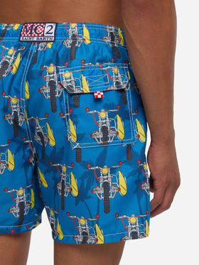 Mid-length swimshorts with surf motorbike