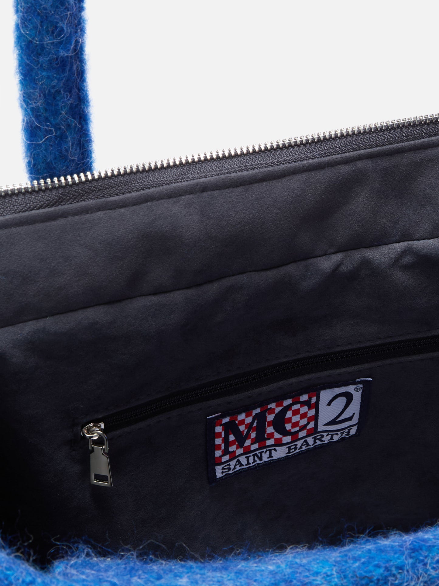 Vanity blanket shoulder bag with side fringes