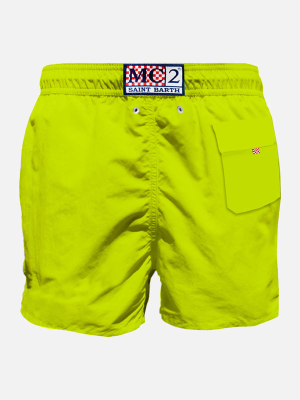 Costume da bagno da uomo giallo fluo con taschino