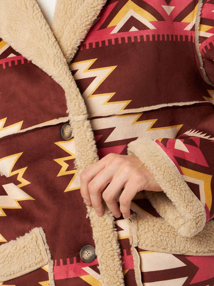 Abrigo reversible de shearling Dorys en beige con motivo étnico 