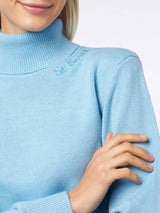 Maglione dolcevita da donna lavorato a maglia di colore azzurro