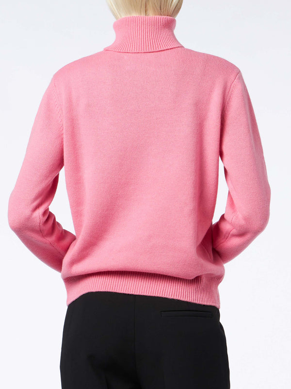 Maglione da donna dolcevita rosa lavorato a maglia 