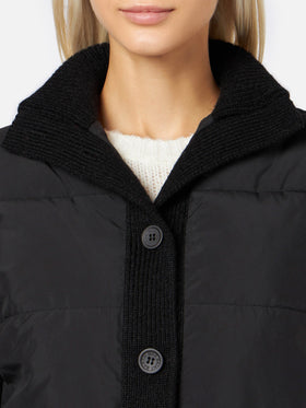 Woman  padded jacket with knitted sleeves