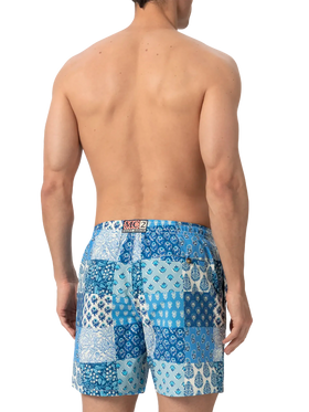 Mid-length swim-shorts Caprese with floral patch print