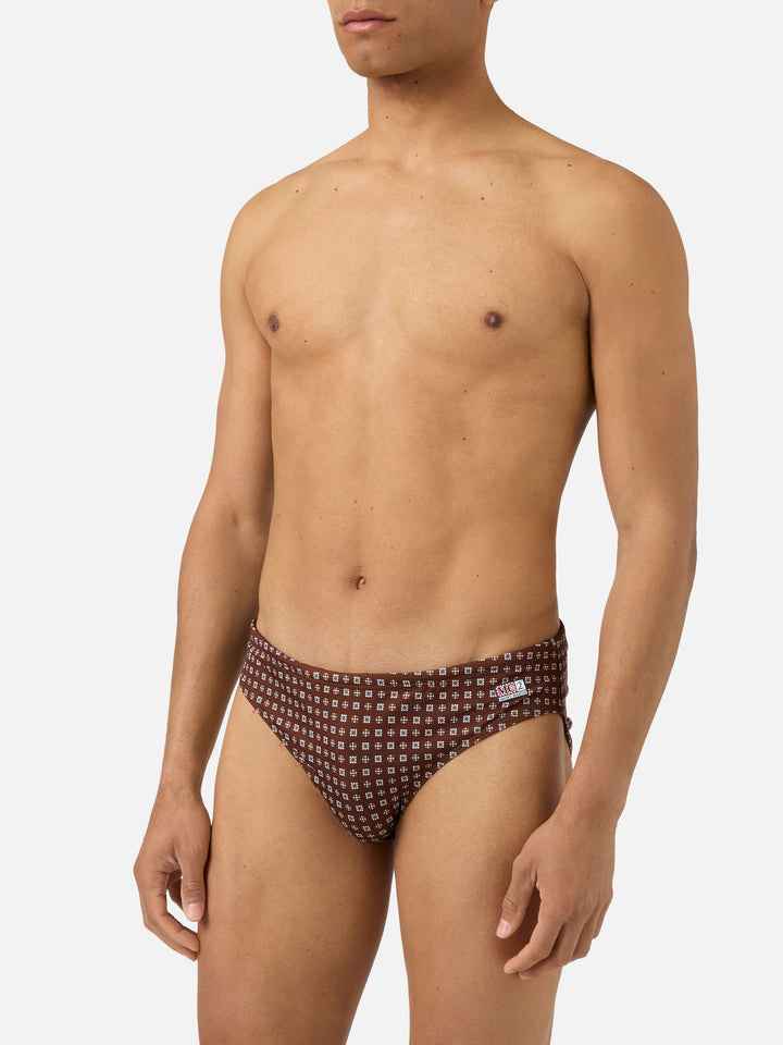 Cayo brown solid swim briefs with geometric print
