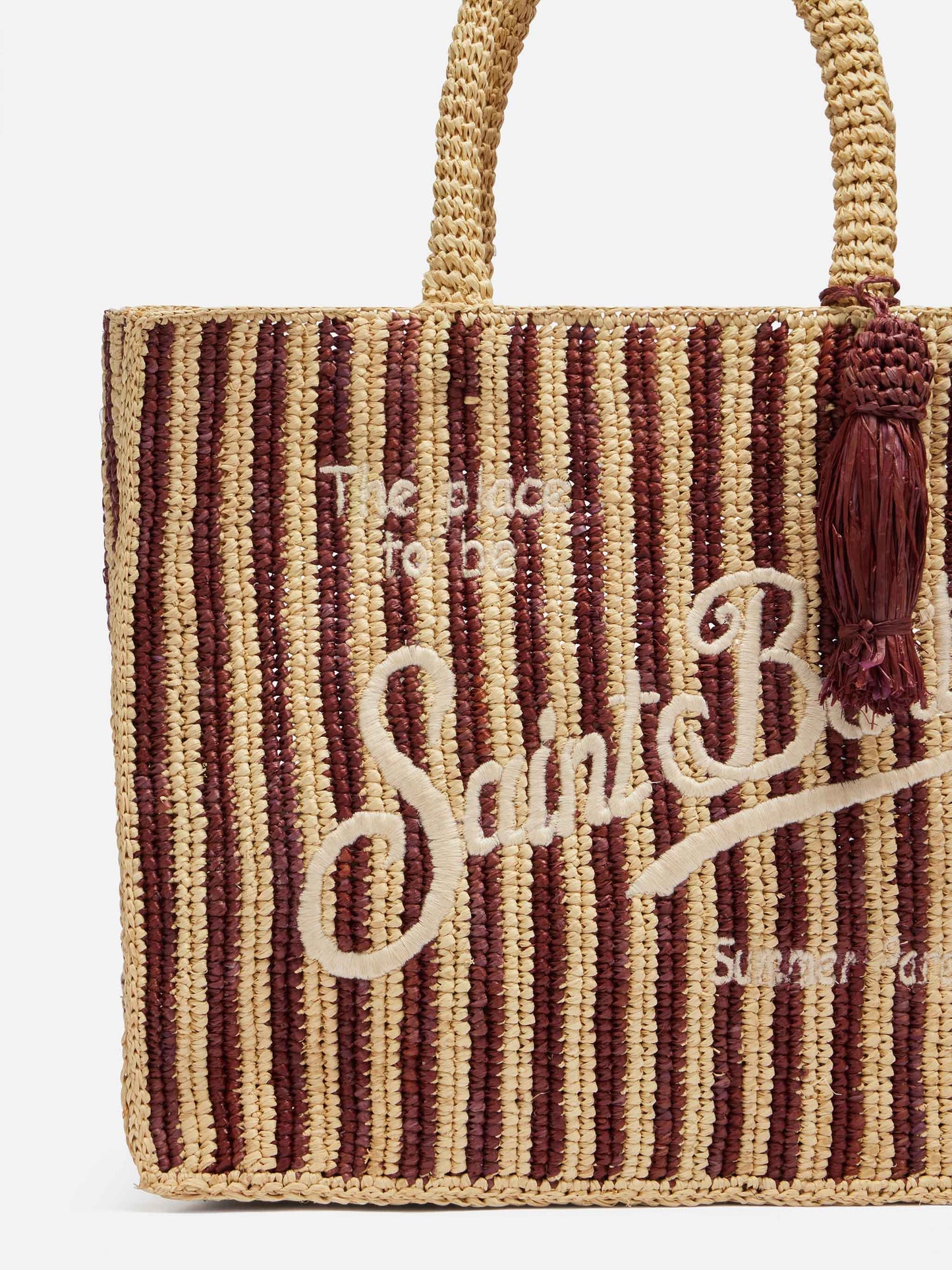 Gestreifte Colette-Tasche aus Raffia mit gesticktem Logo und Quaste 