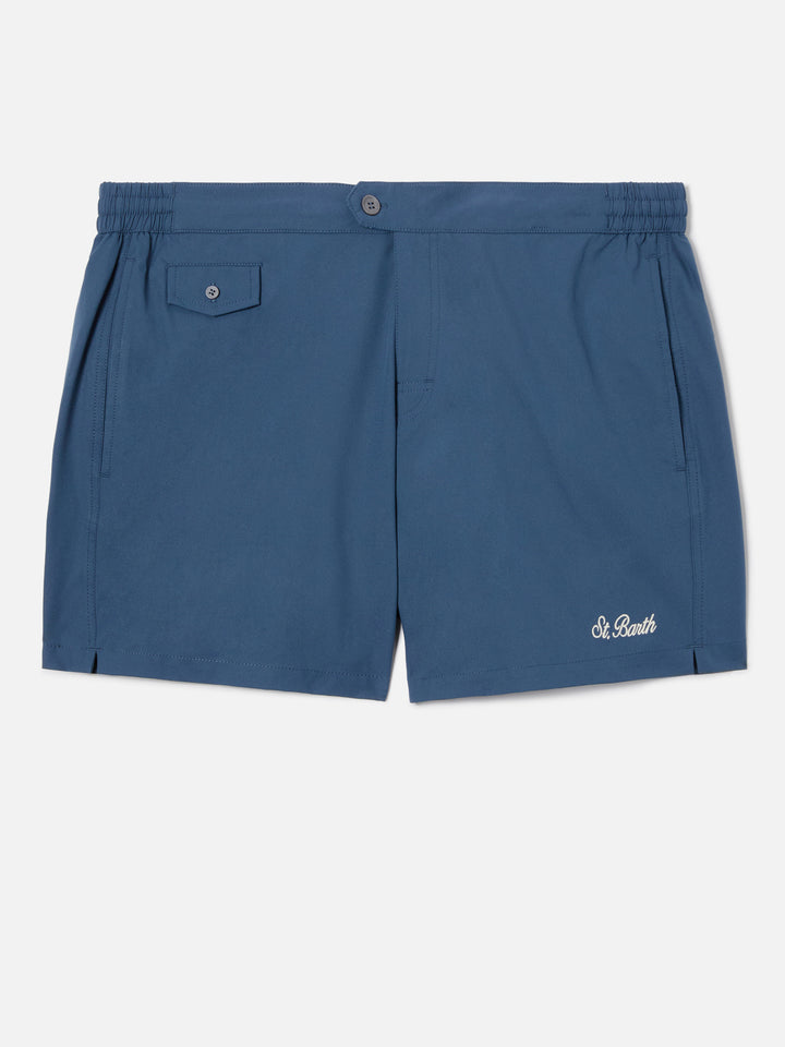 Capferrat swim shorts in solid navy blue with embroidered logo