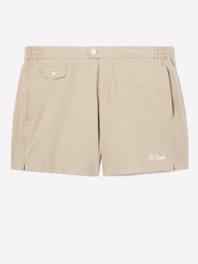Capferrat swim shorts in solid beige with embroidered logo