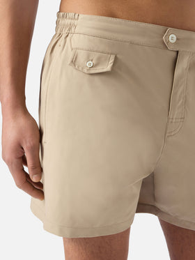 Capferrat swim shorts in solid beige with embroidered logo