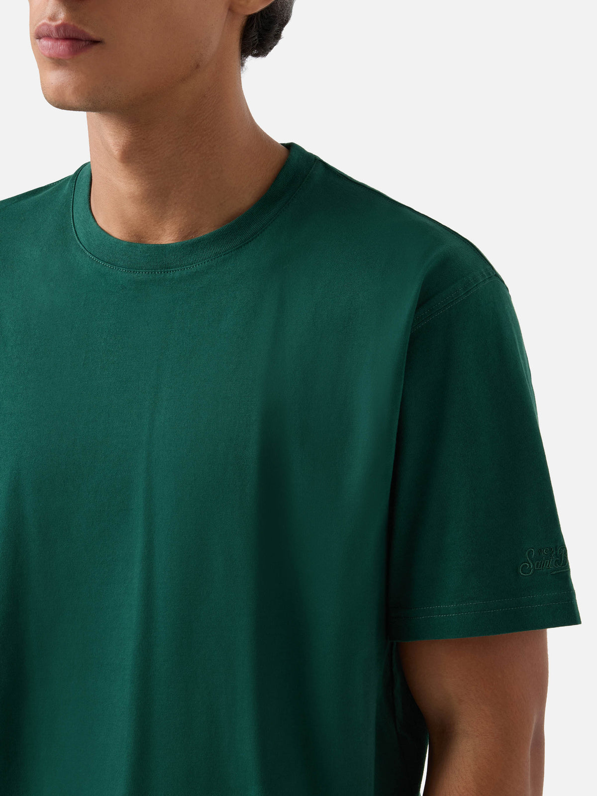 Jedes T-Shirt aus grüner Baumwolle 