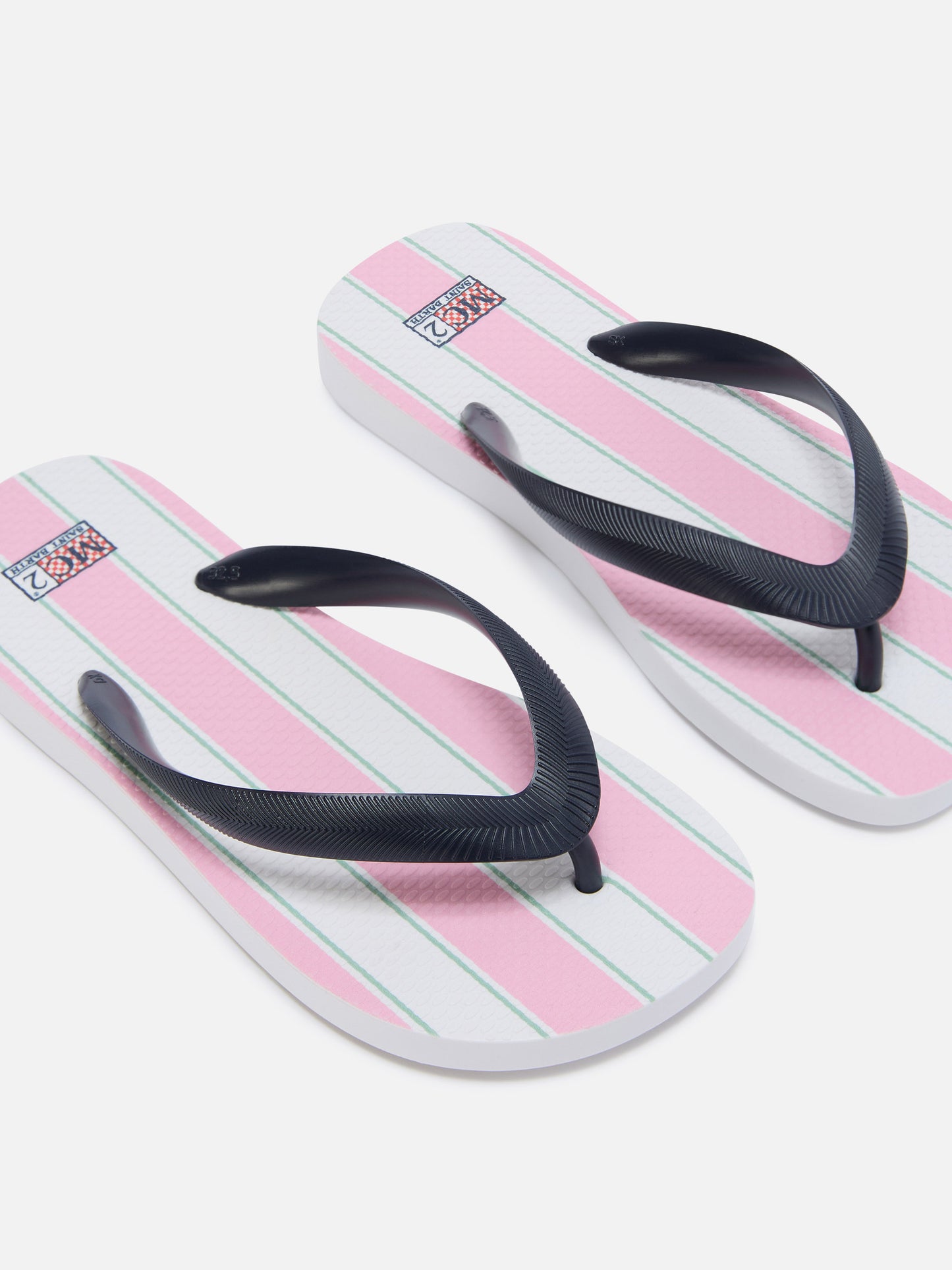 Chanclas tipo slip-on de goma con rayas rosas y blancas 