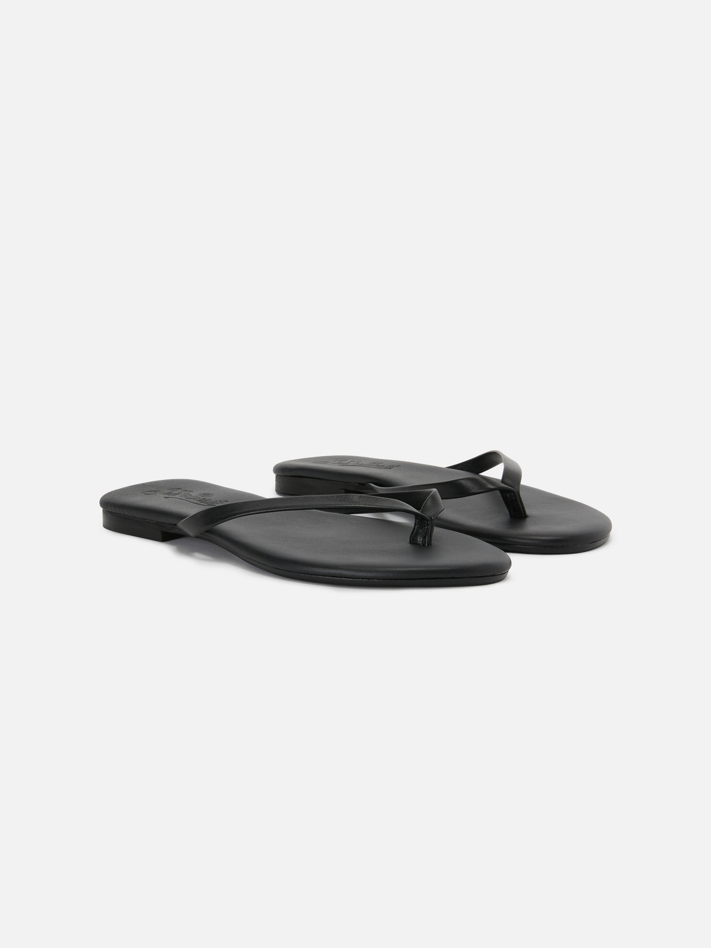 Essentials real leather flip flops in black