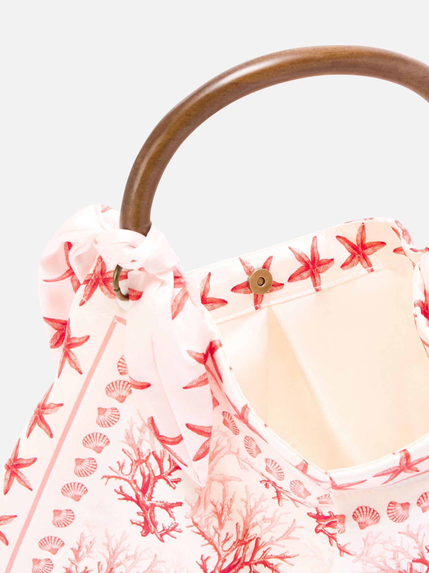 Sac foulard à la structure souple et au motif corail 