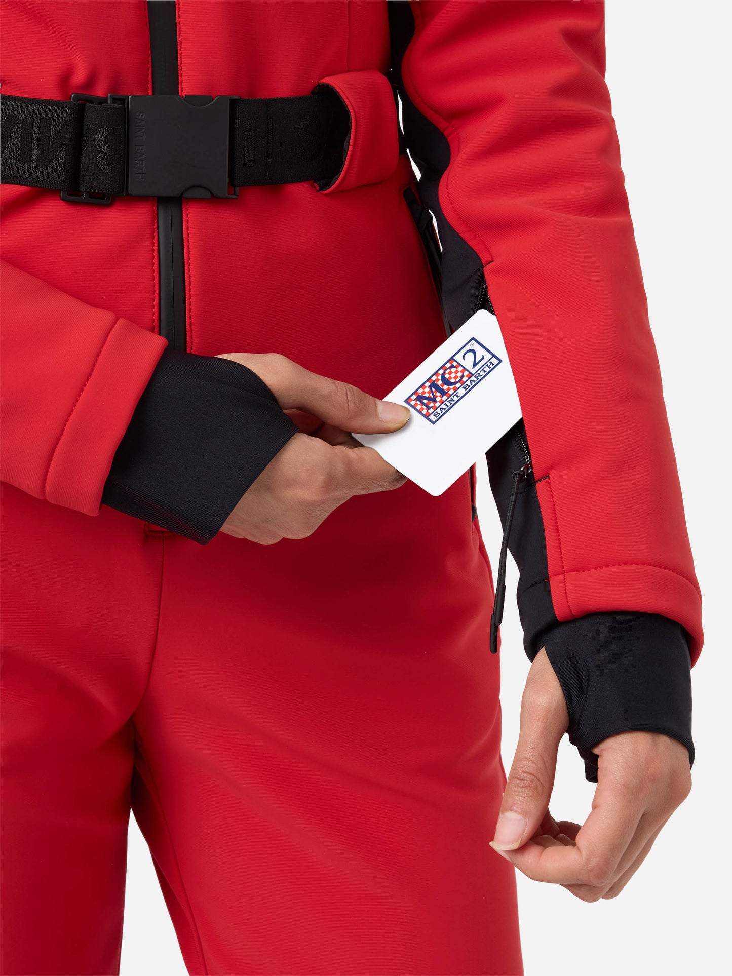 Woman red ski suit Garmisch with RECCO® technology