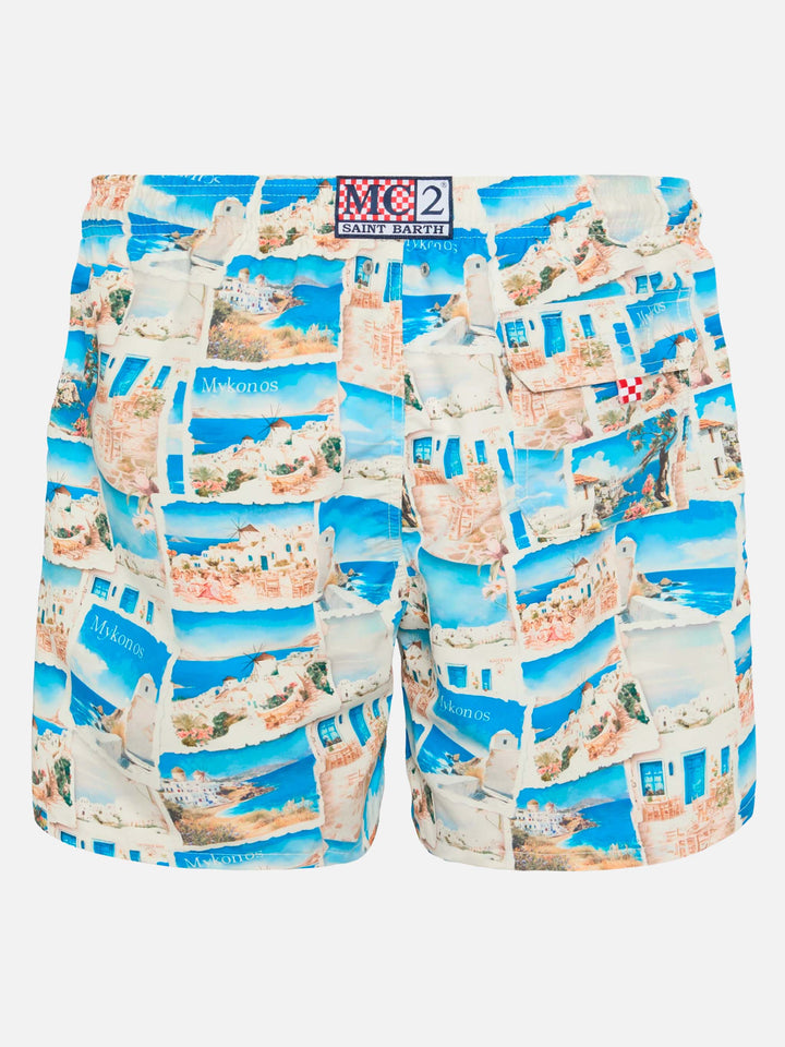 Mid-length Gustavia swim-shorts with Mykonos postcard print | AI CO-CREATED DESIGN BY RICKDICK - POWERED BY RED-EYE