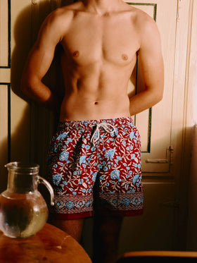 Gustavia burgundy swim shorts with floral print