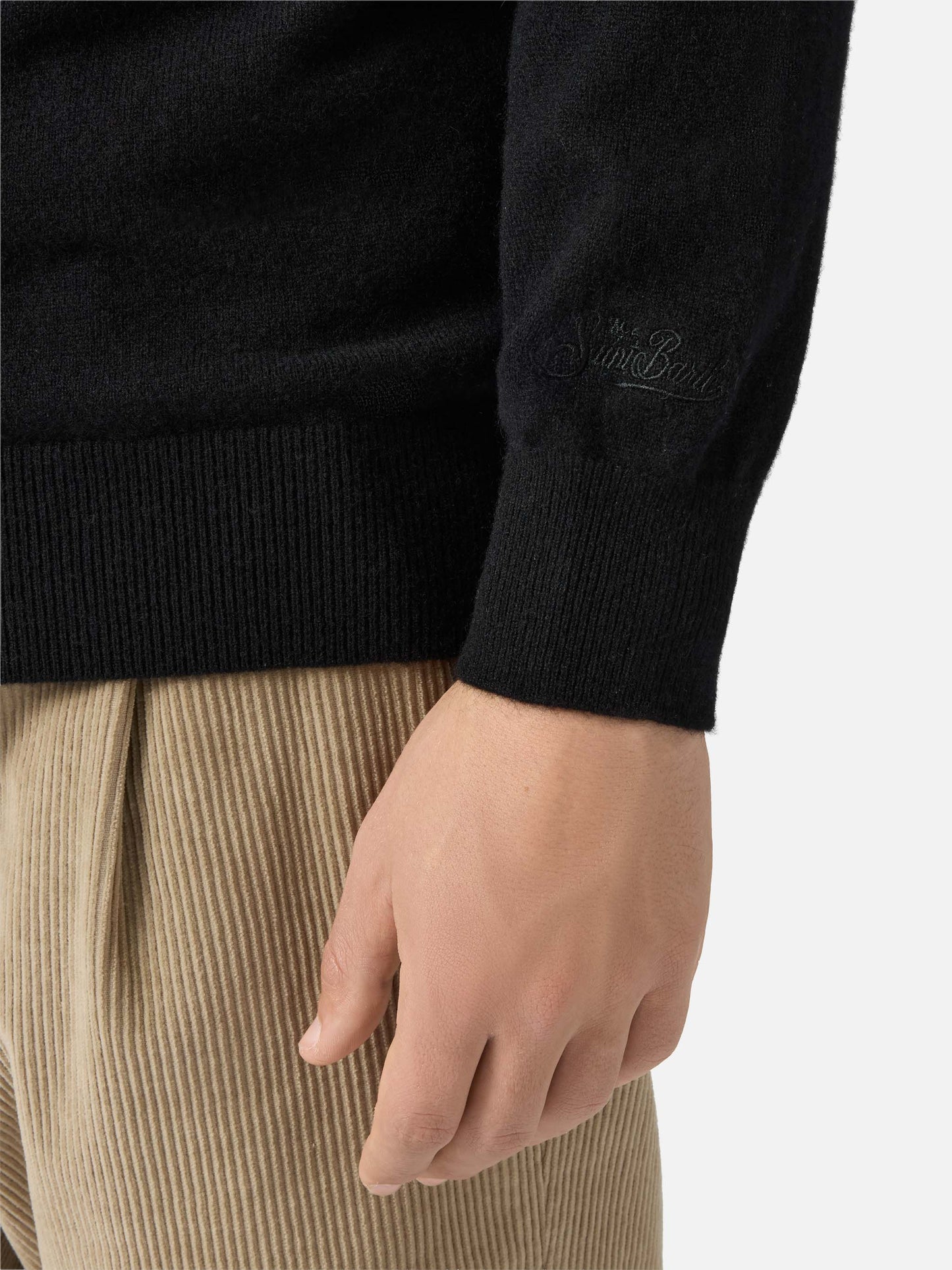 Heron Light sweater in 100% black CASHMERE with St. Moritz intarsia | ST. MORITZ TOP OF THE WORLD