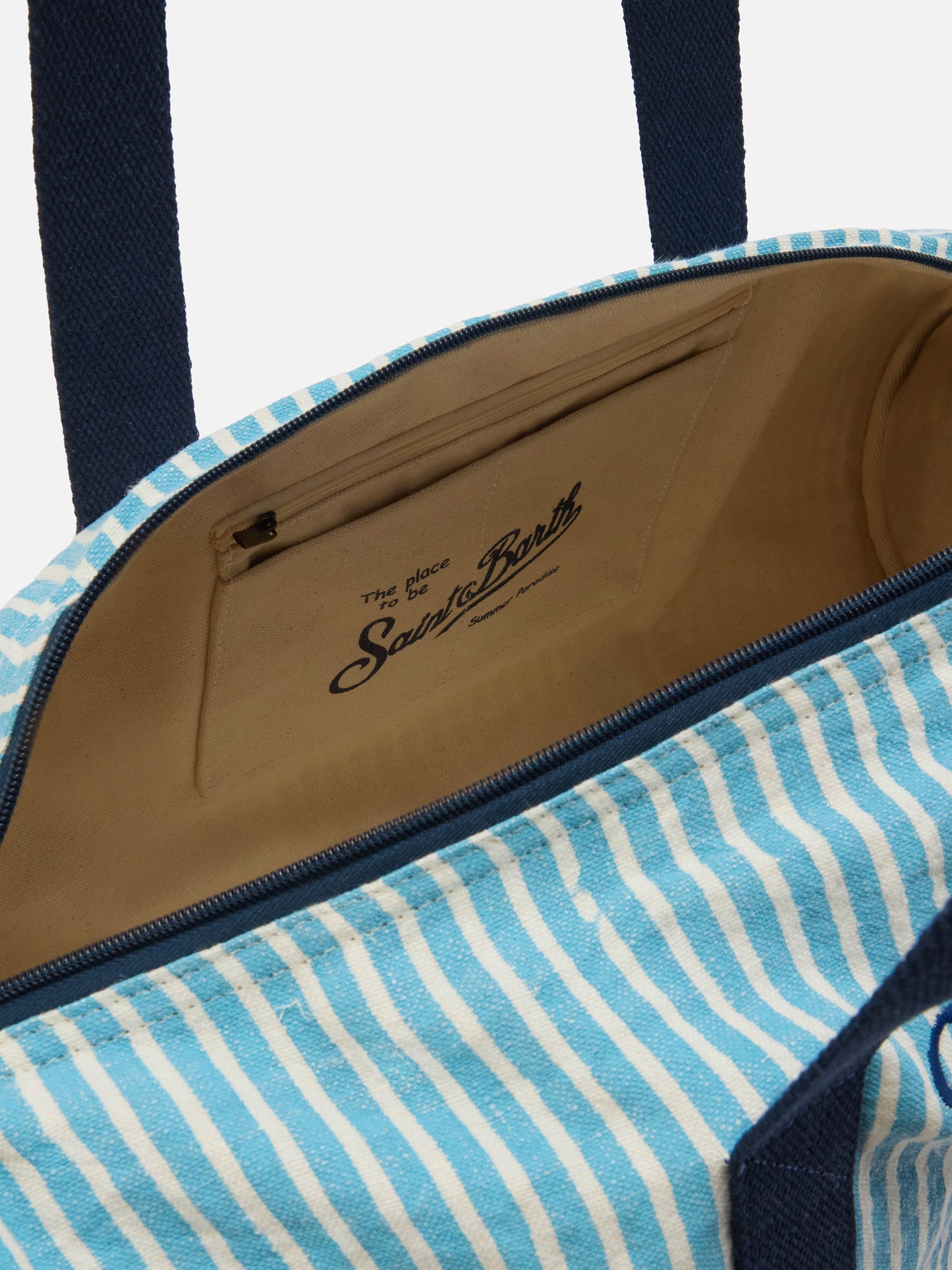 Round Jetleg blue and white striped linen weekender