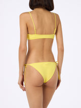 Woman pale yellow bralette bikini Judy Virgo