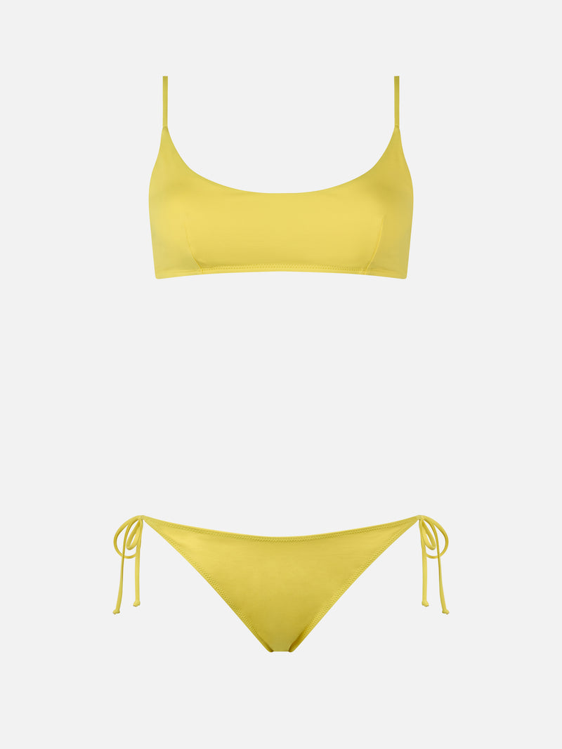 Woman pale yellow bralette bikini Judy Virgo