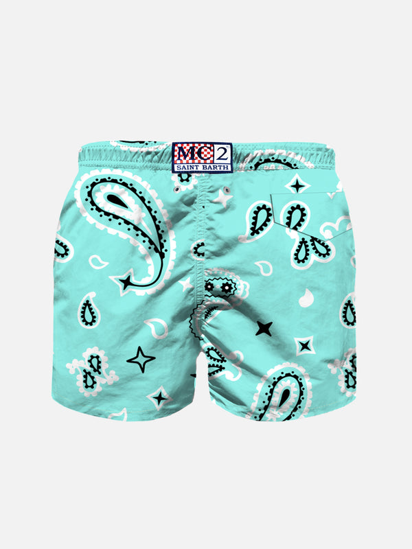 Boy water green swim shorts with bandanna pattern