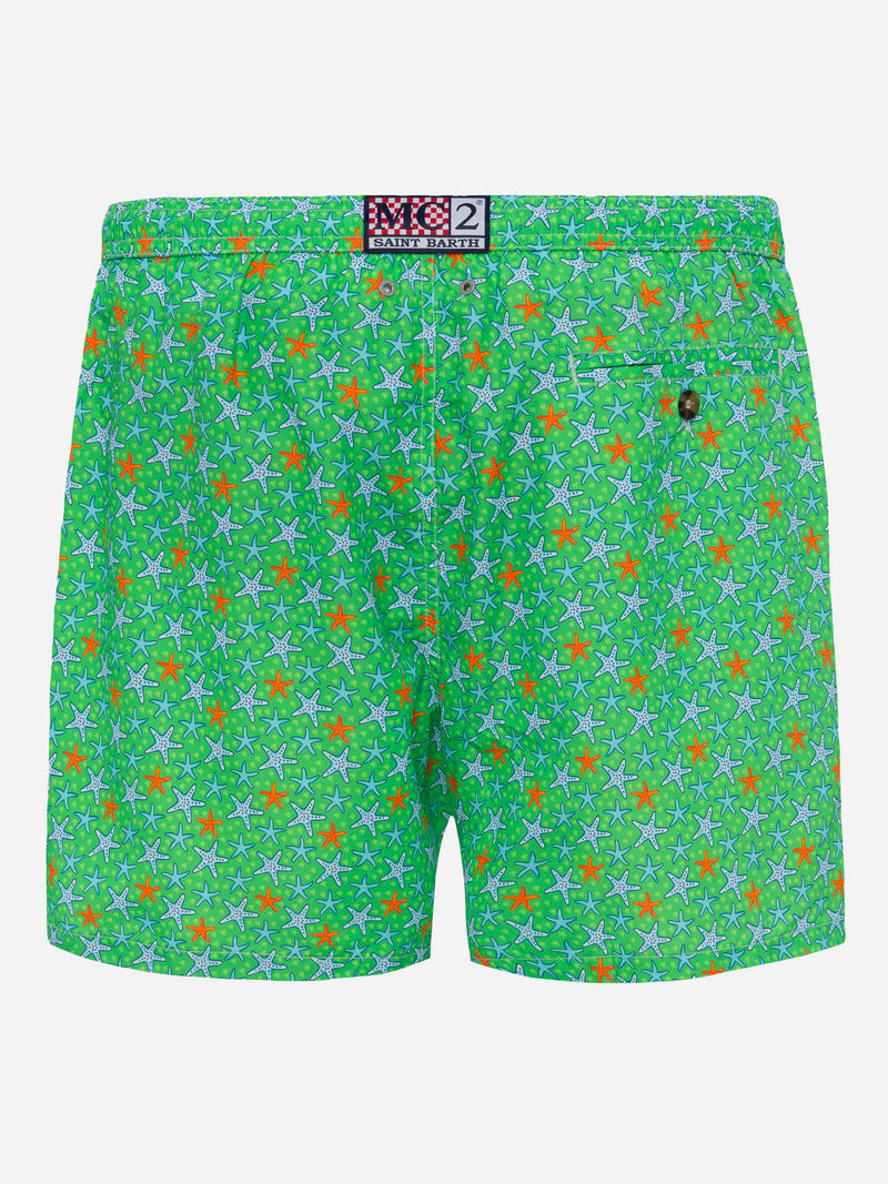 Man light fabric swim shorts with multicolor starfish print