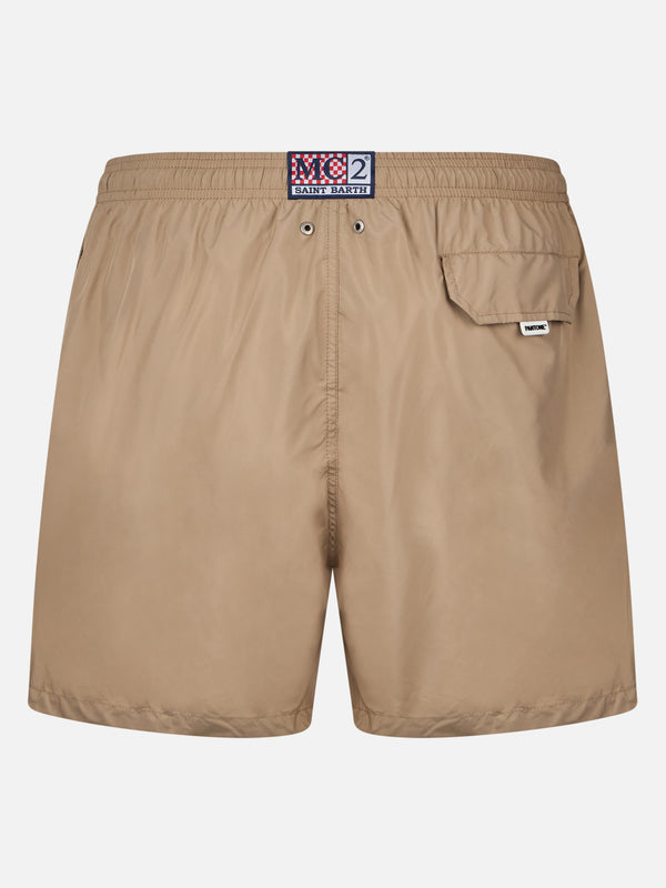 Man lightweight fabric beige swim shorts Lighting Pantone | PANTONE® SPECIAL EDITION