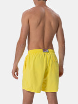 Man lightweight fabric light yellow swim shorts Lighting Pantone | PANTONE® SPECIAL EDITION