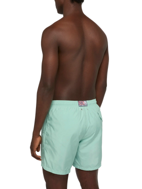 Lightweight fabric sage green swim shorts Lighting Pantone | PANTONE® SPECIAL EDITION