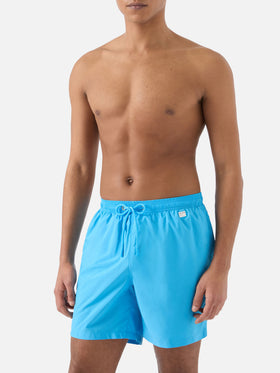 Lighting Pantone swim shorts in solid sky blue | Special Edition