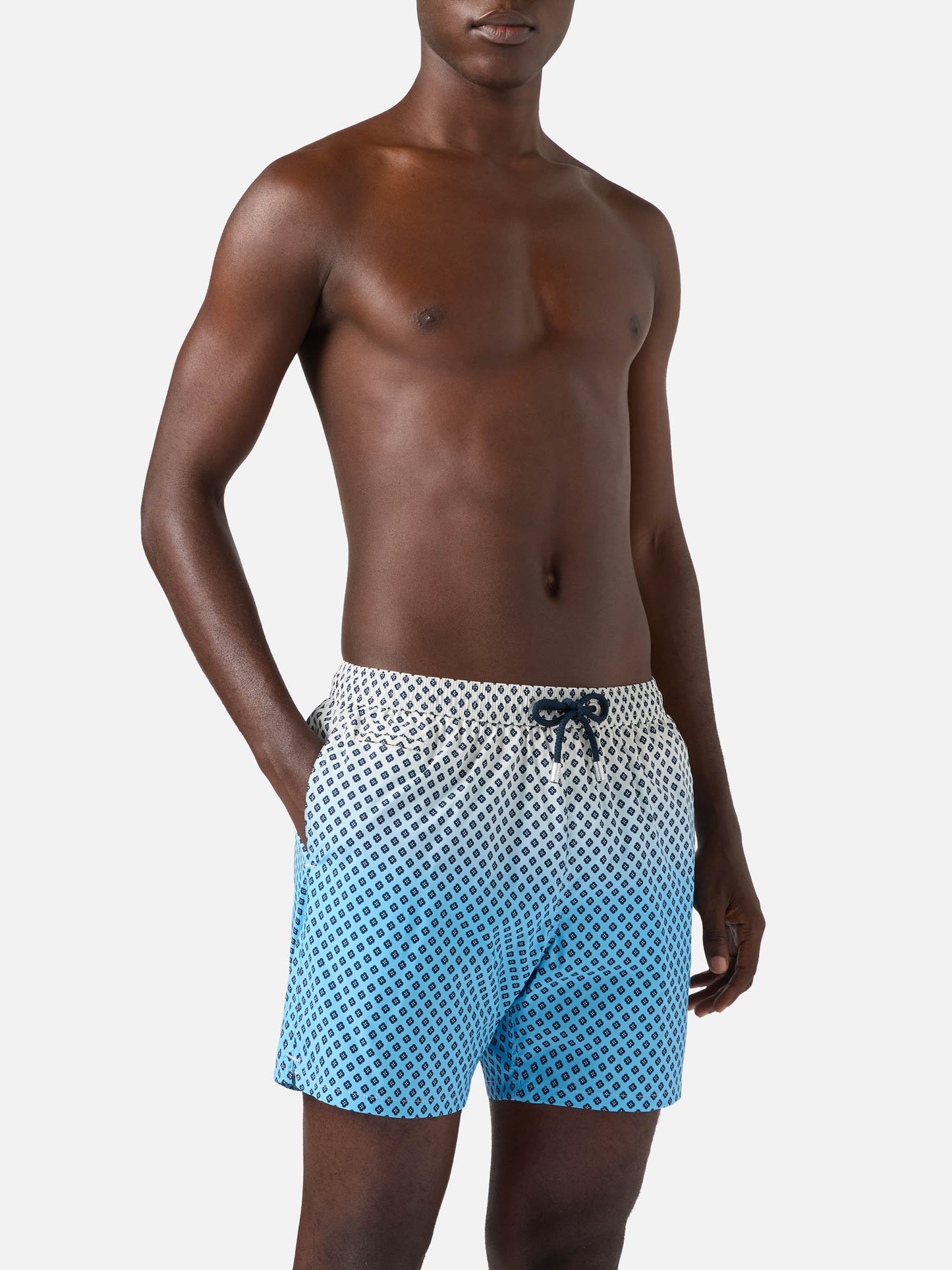 Lighting Micro swim shorts with geometric print on shaded background