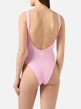Lora one-piece swimsuit in pink solid color crinkle fabric