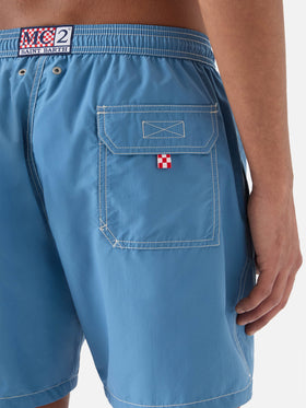 Patmos swim shorts in solid dusty blue