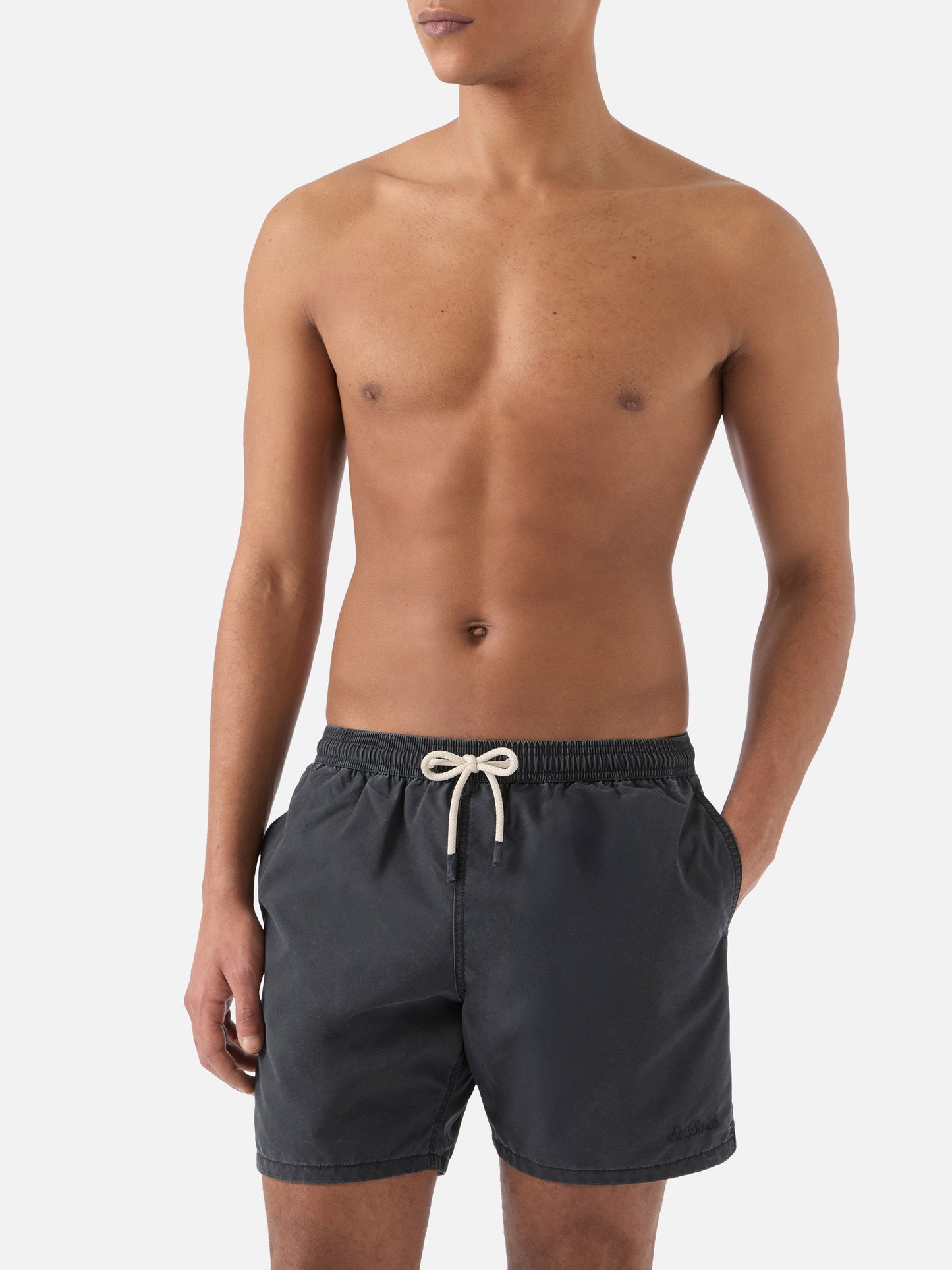 Patmos swim shorts in black with used effect and logo embroidery