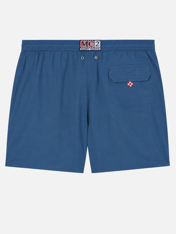 Patmos swim shorts in navy blue with used effect and logo embroidery
