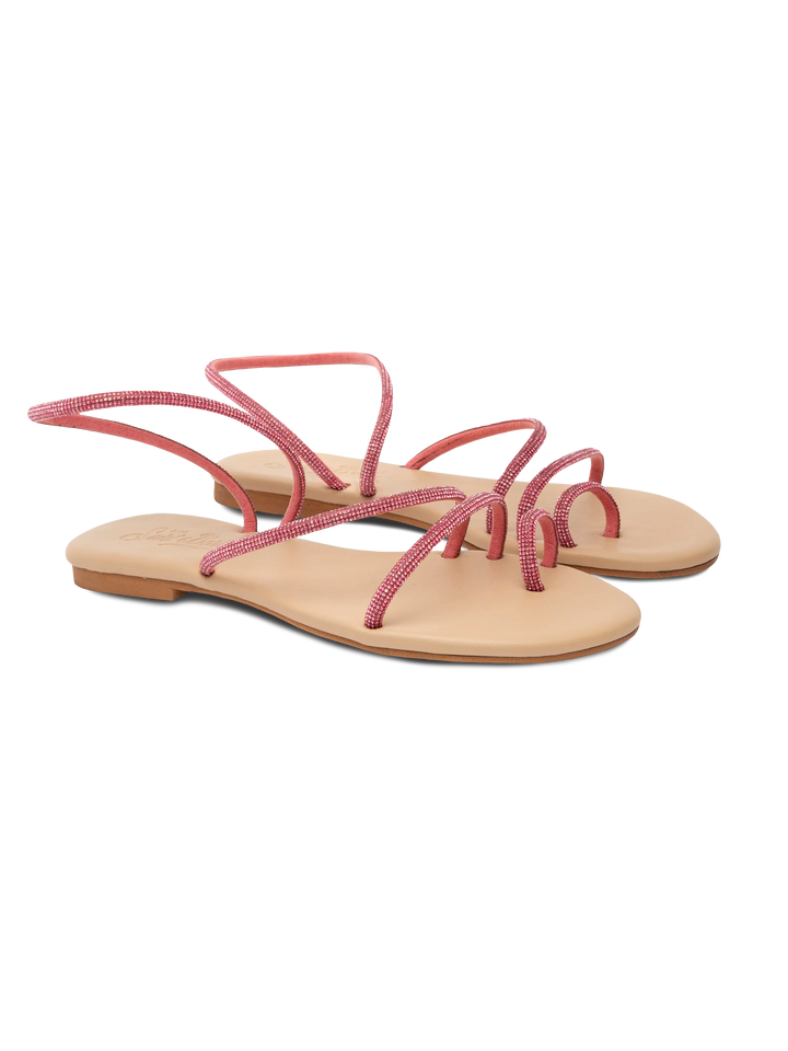 Flache Ringsandalen mit pinkfarbenen Strasssteinen