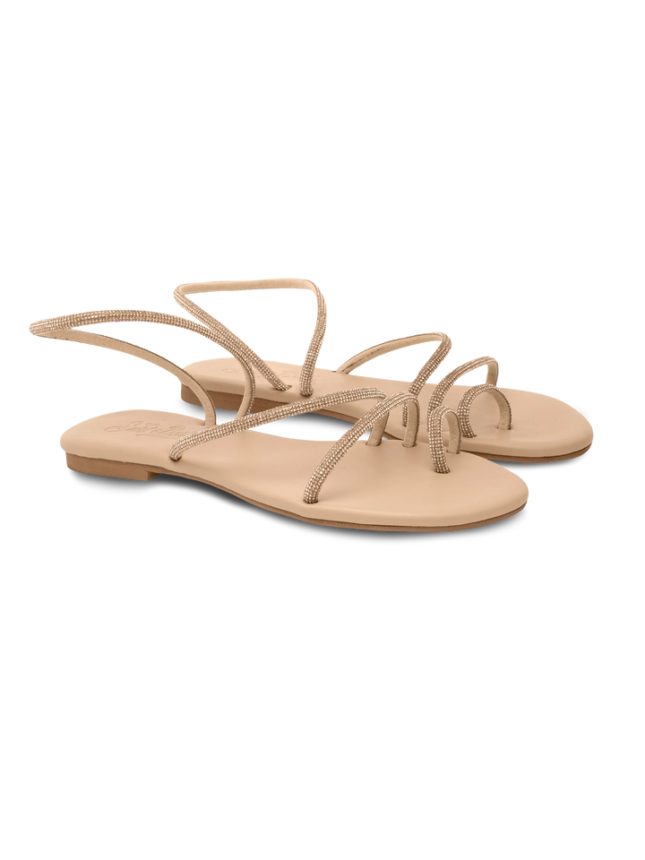 Flache Ringsandalen mit beigen Strasssteinen