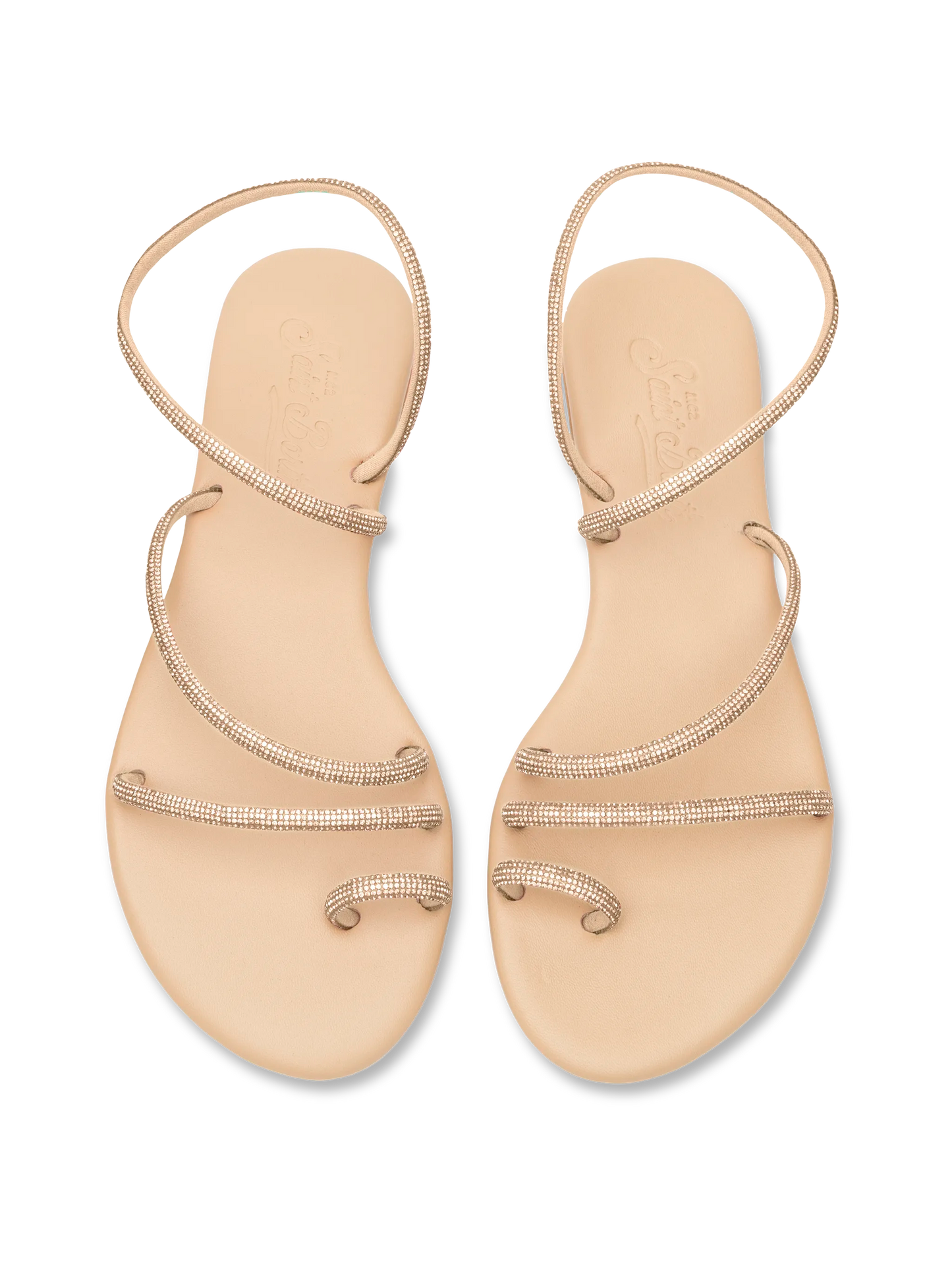Flache Ringsandalen mit beigen Strasssteinen