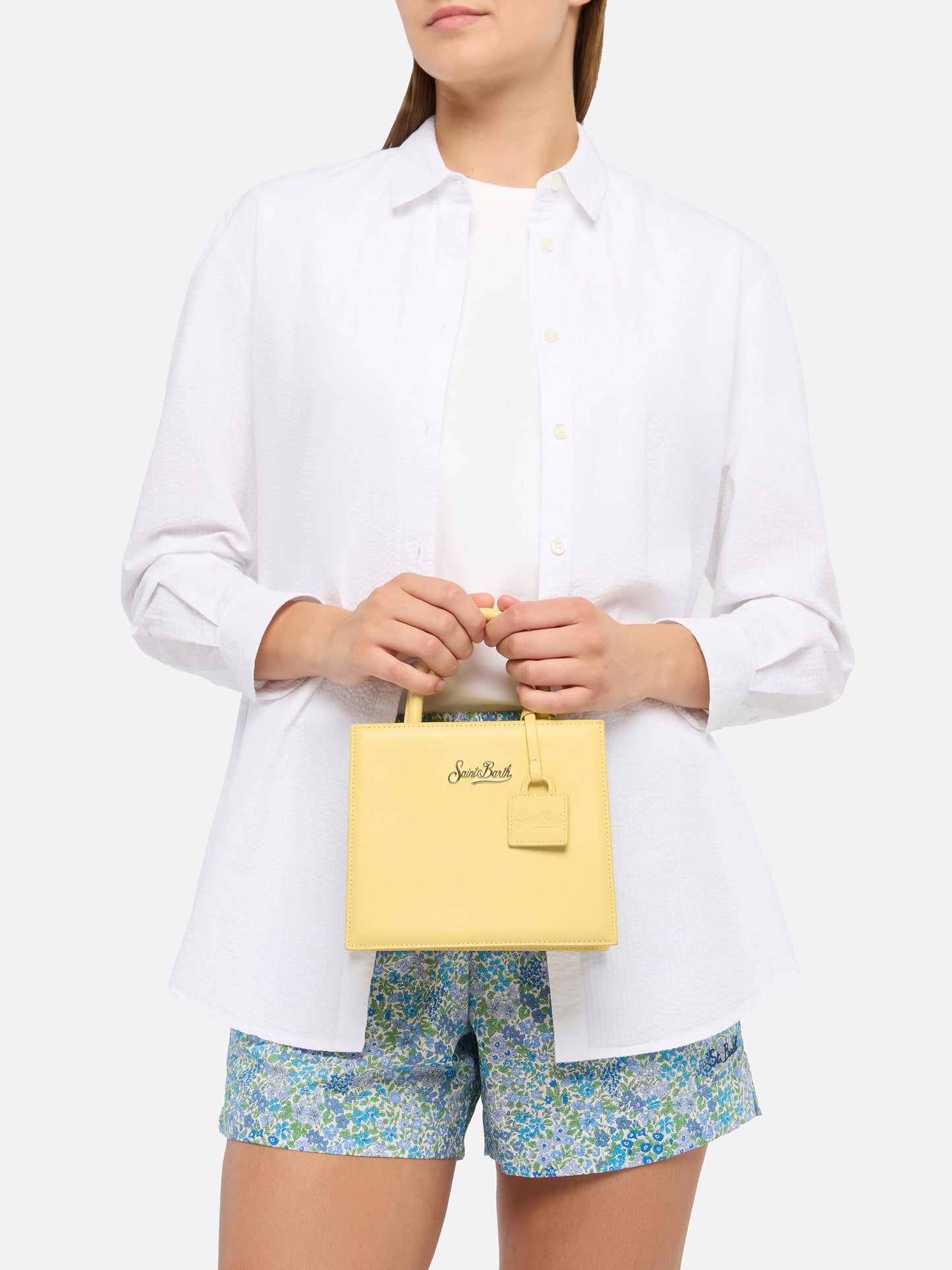 Structured Shop mini bag in butter yellow smooth leather with metal tag
