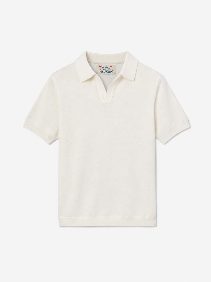 Polo Sloan Jr in maglia bianca