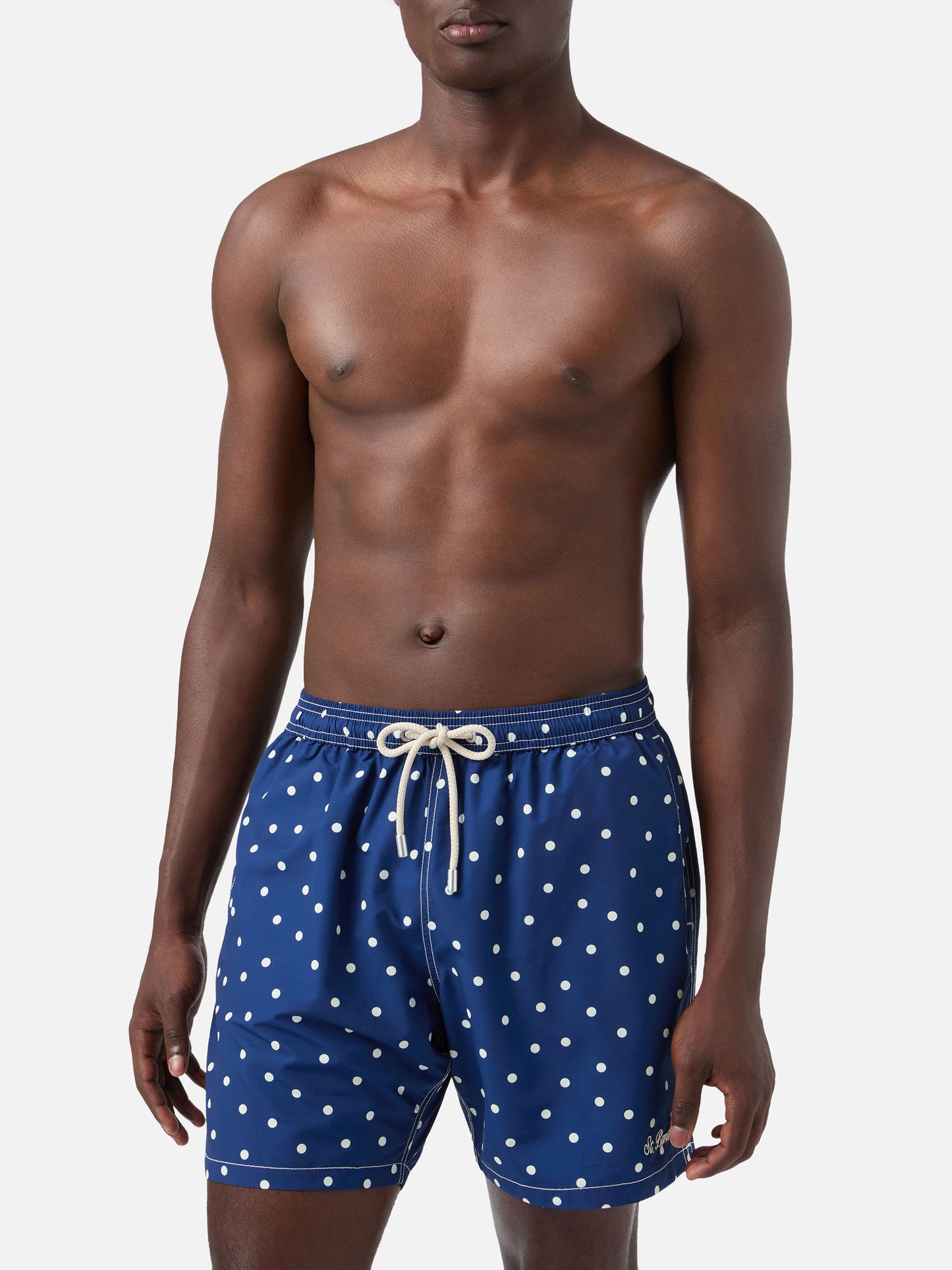 Syros swim shorts in blue with polka dot embroidery