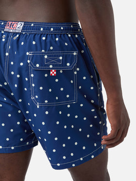 Syros swim shorts in blue with polka dot embroidery