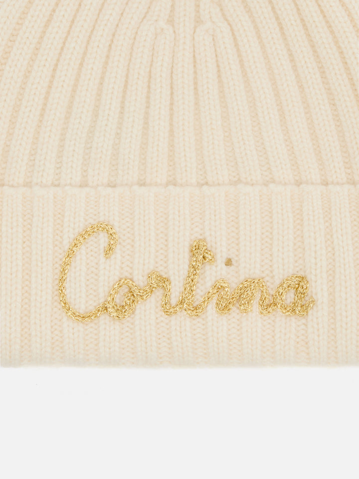 Berretto Wengen in misto cashmere bianco con ricamo lurex Cortinae pompon