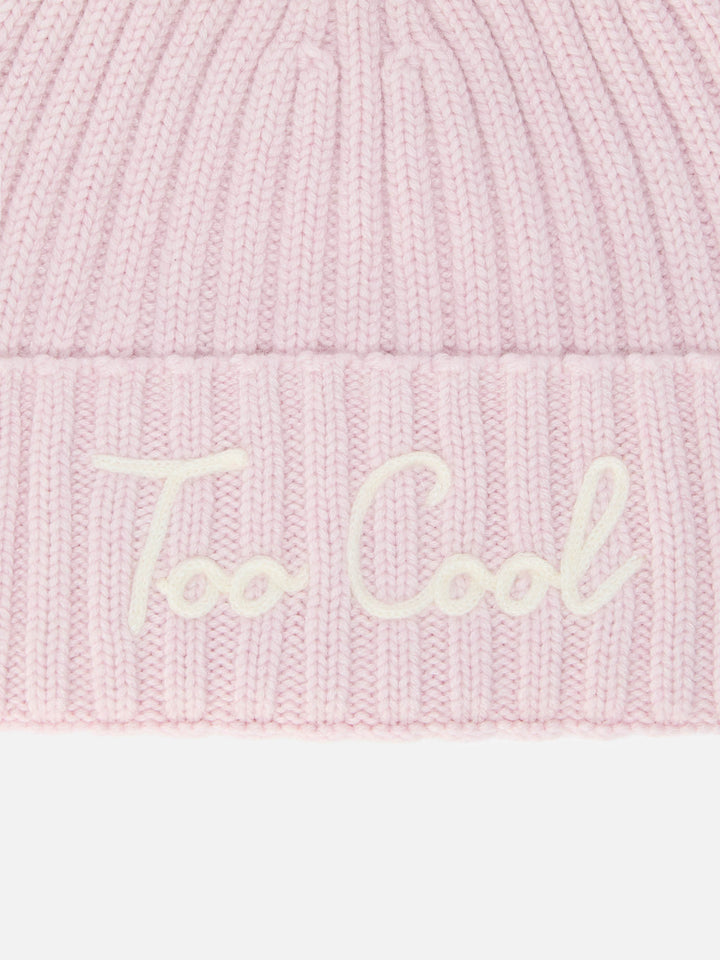 Wengen beanie in cashmere blend with pink “Too Cool” embroidery and pom-pom