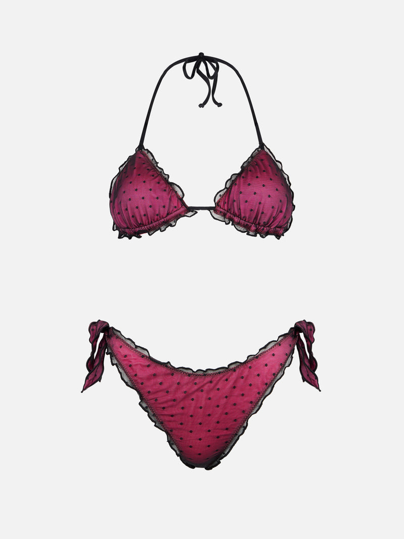 Glänzender Fuchsia-Bikini mit schwarzem Tupfentüll