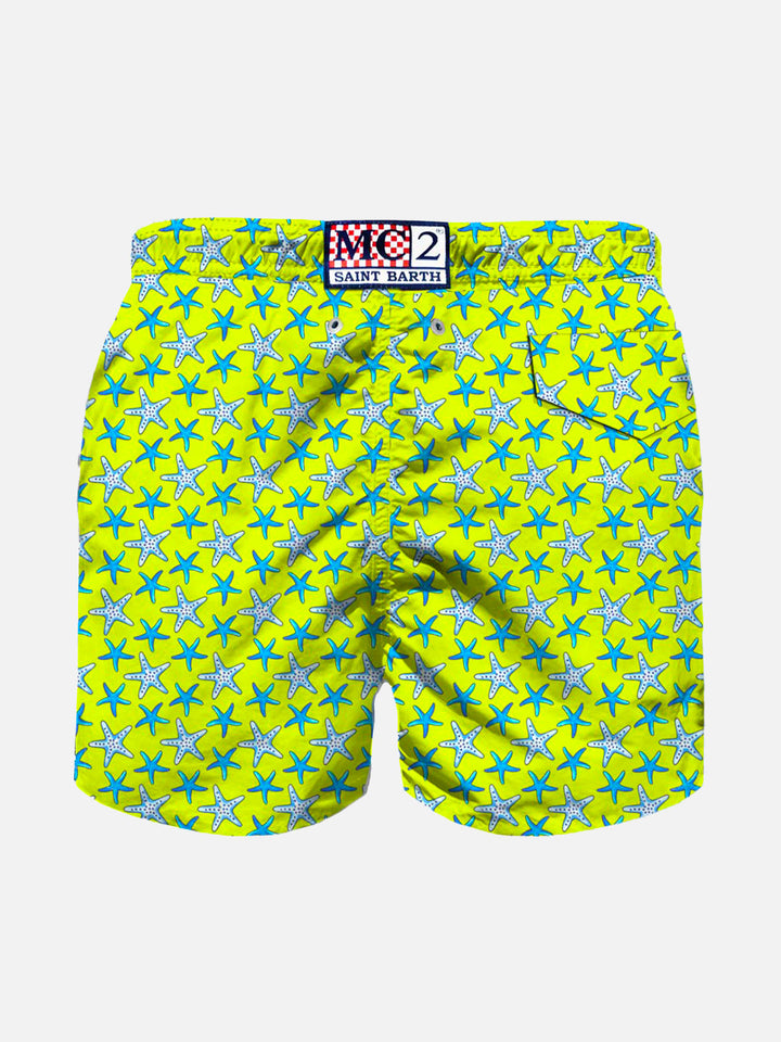 Boy light fabric swim shorts with starfish print