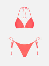 Woman fluo red triangle bikini