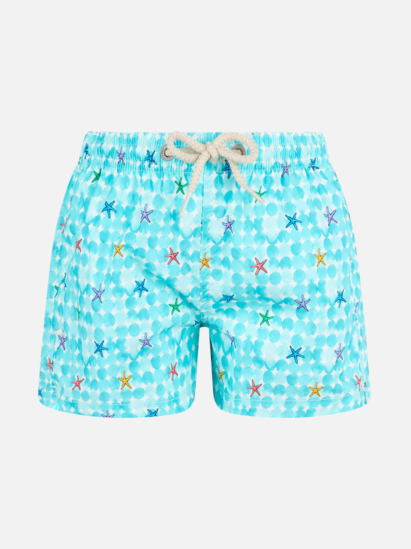 Boy light blue swim shorts with starfish print and comfort fabric