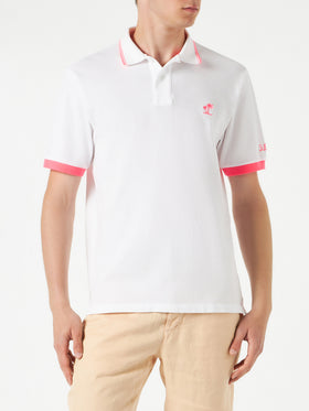 Polo in piquet bianco con ricamo palme